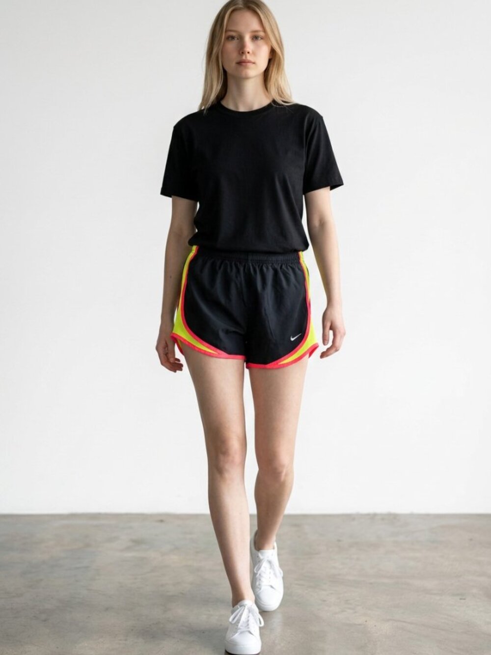 Nike Women’s Black Athletic Shorts with Neon Yellow Panels and Pink Trim